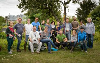 Gruppenbild Teameinsatz Nachhaltigkeitswoche Coca-Cola